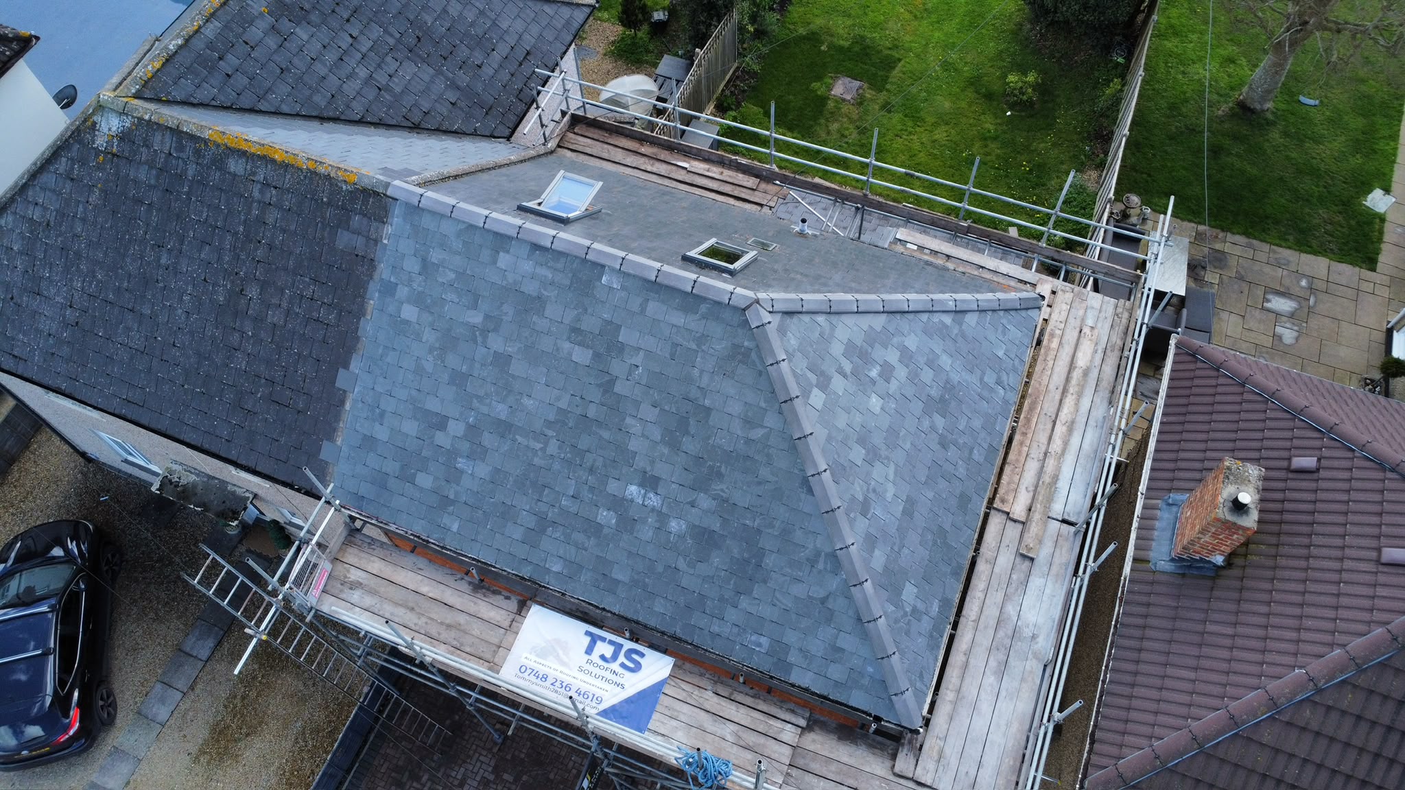 Slate roof and scaffolding from TJS Roofing Solutions