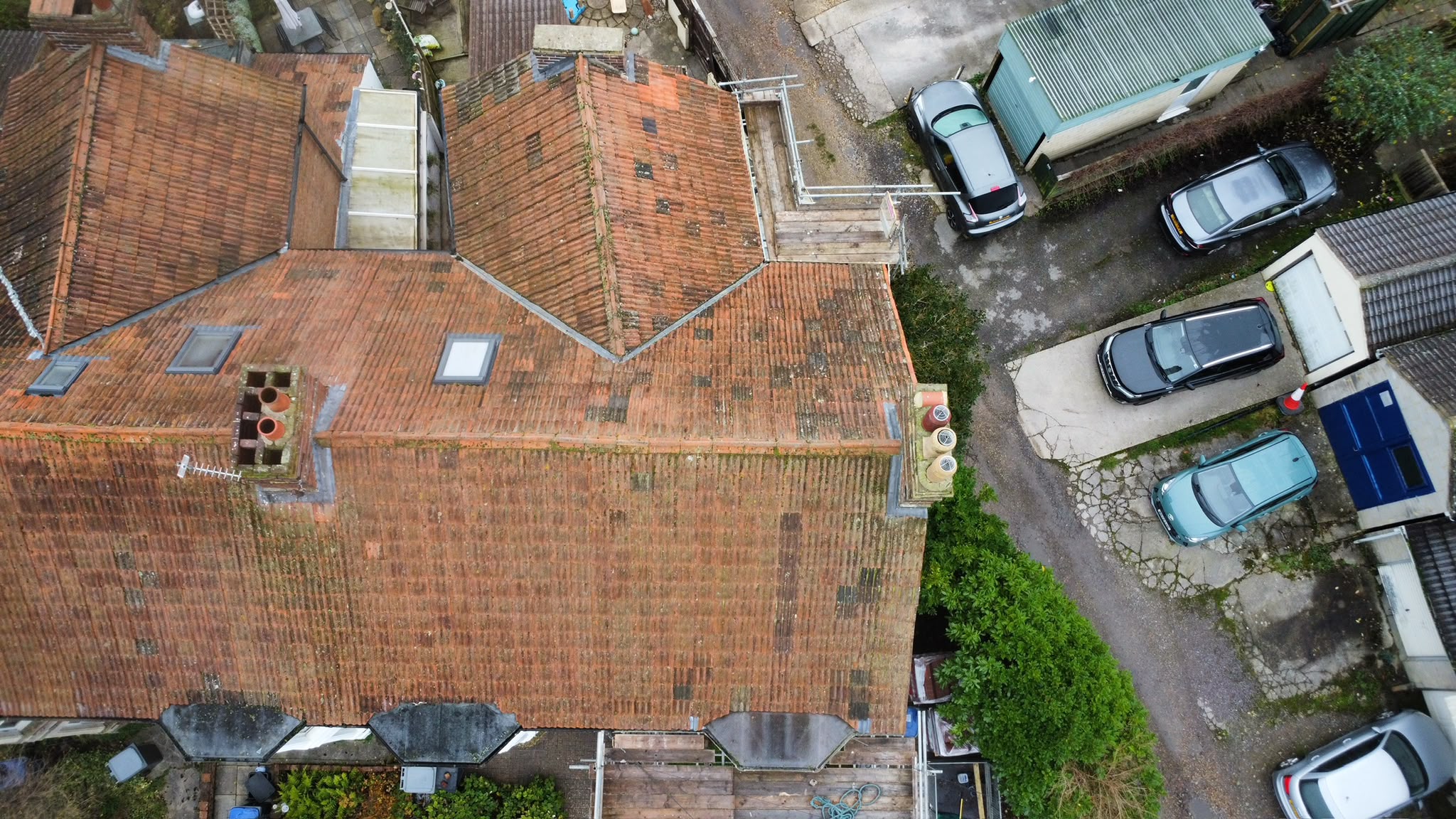 Before — roof with roof windows from TJS Roofing Solutions
